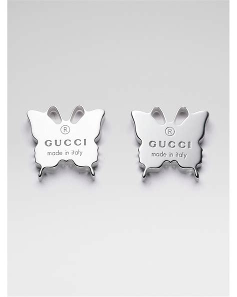 silver gucci interlocking earrings|Gucci silver butterfly earrings.